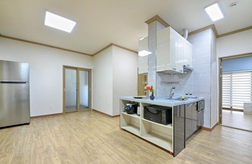 Tarimok House | Relax at Suncheonman Ddel Pension with Pool & Family Amenities