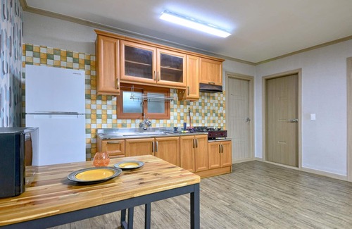 Tarimok House | Relax at Suncheonman Ddel Pension with Pool & Family Amenities