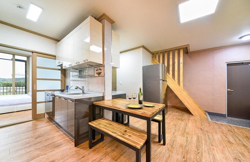 Tarimok House | Relax at Suncheonman Ddel Pension with Pool & Family Amenities