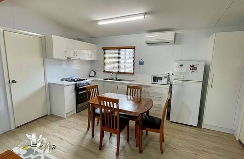 Broadwater Cabin | Cozy Sundowner Cabin with Oceanfront Views and Pool