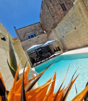 Xewkija House | Enchanting Sunflower Farmhouse: Oceanfront Retreat & Pool