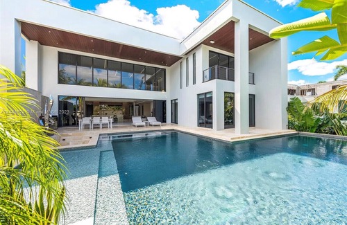 Seybold Villa | Enchanting Waterfront Estate with Dock & Movie Theater