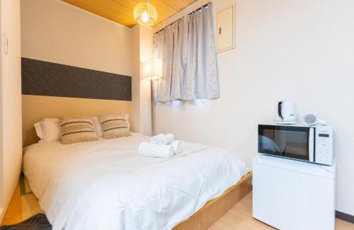 Jusohonmachi Apartment | Sunny 2ppl elevator apt Juso 6 mins