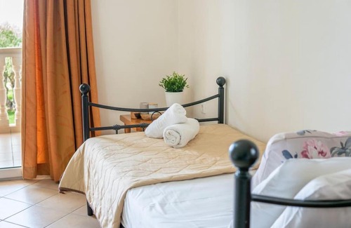 Amoudi Apartment | Inviting Sunny Apartment at Klelia Cottage - Rated 9.3/10
