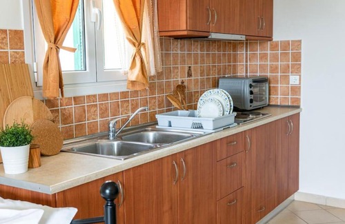 Amoudi Apartment | Inviting Sunny Apartment at Klelia Cottage - Rated 9.3/10