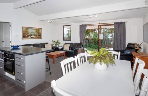 Papamoa Beach House | Relaxing Sunny Beach Bach with Oceanfront Serenity