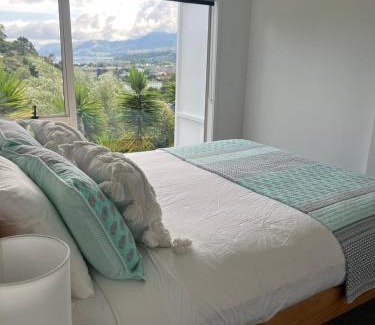 Nelson Apartment | Sunny hillside central Nelson hideaway with city to sea views