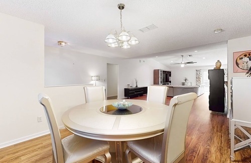 Palm Coast House | Sunny home with private heated pool, pool spa, fireplace, patio, grill, W/D, AC
