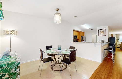 Palm Coast House | Sunny home with private heated pool, pool spa, fireplace, patio, grill, W/D, AC