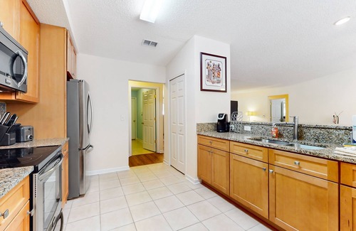 Palm Coast House | Sunny home with private heated pool, pool spa, fireplace, patio, grill, W/D, AC