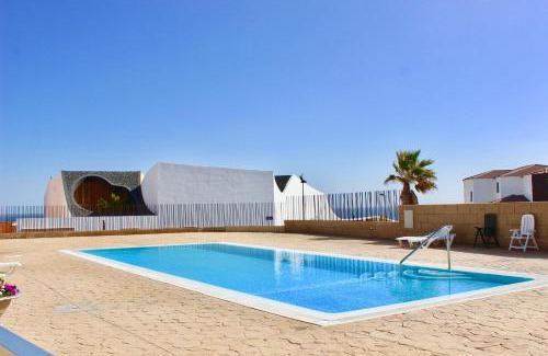 Poris de Abona Apartment | Oceanfront Paradise: 9/10 Rated with Pool & Breakfast