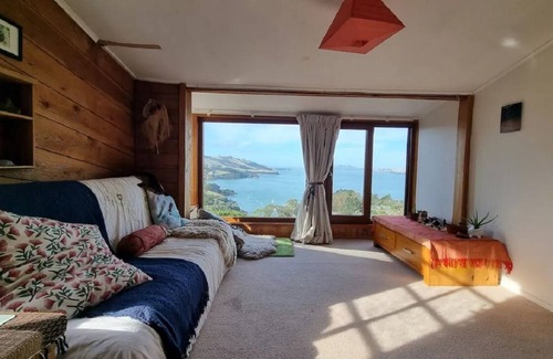 Careys Bay House | Sunny Private Retreat With Incredible Views Close to Town, Stadium and Uni