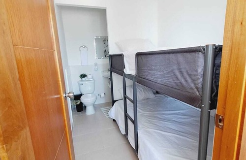 Pantoja Apartment | Relaxing 4BR Retreat with Private Roof and Spa Amenities