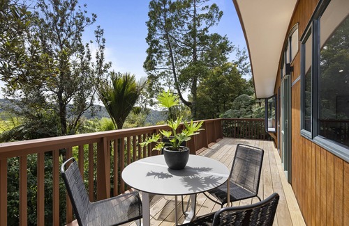 Bethells Beach House | Cozy Retreat Minutes From The Beach with Family Amenities