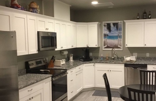 St. George House | Sunny Basement Retreat with Private Entrance and Pool Access