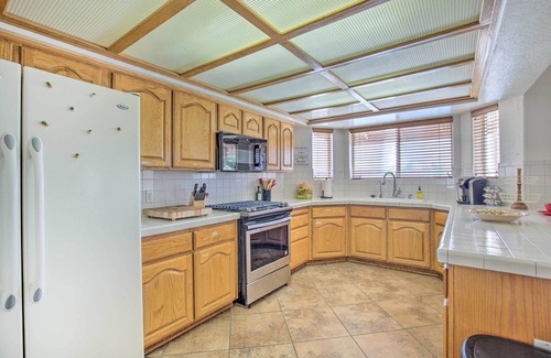 Yuma Cottage | Inviting Yuma Retreat with Private Pool and Grill Access