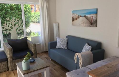 Beekbergen-West Ski Chalet | Discover Sunnychalet: Oceanfront Retreat with Pool Access