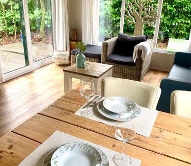 Beekbergen-West Ski Chalet | Discover Sunnychalet: Oceanfront Retreat with Pool Access