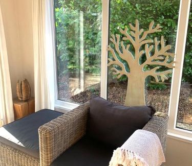 Beekbergen-West Ski Chalet | Discover Sunnychalet: Oceanfront Retreat with Pool Access