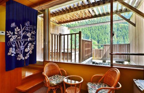 Miyoshi Hotel | Relax at Sunriver Oboke with Hot Tub and High Ratings