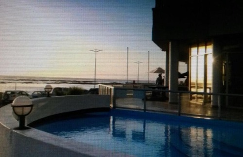 Strand Hotel | Relax at Sunset 786 Holidays: Pool, Spa & Family-Friendly