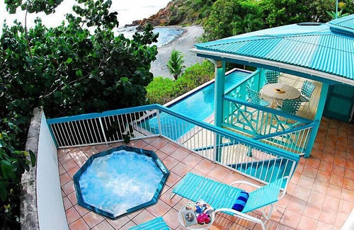 Hart Bay Villa | Beachfront Bliss at Sunset Beach: Pool & Hot Tub Retreat