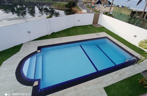 Hettimulla House | Relax at Sunset Beach Rest with Oceanfront Amenities