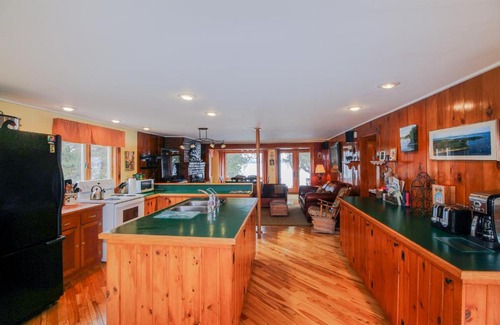 South Hero House | Oceanfront Escape at Sunset Beach with Private Amenities