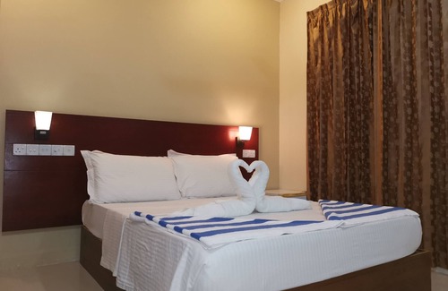 Dhangethi House | Relax at Sunset Beach View with Breakfast & Family Amenities