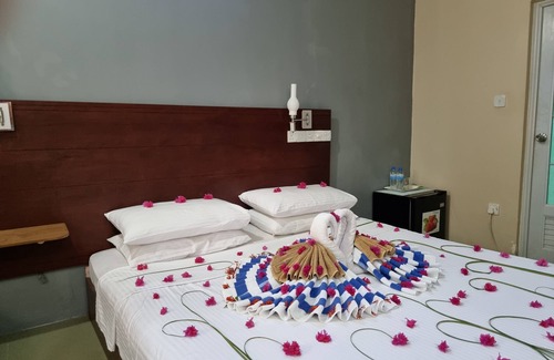 Dhangethi House | Relax at Sunset Beach View with Breakfast & Family Amenities