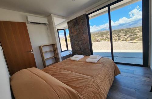 Potrerillos Ski Chalet | Experience Sunset de los Andes Lodge: 4-Star Retreat with Hot Tub
