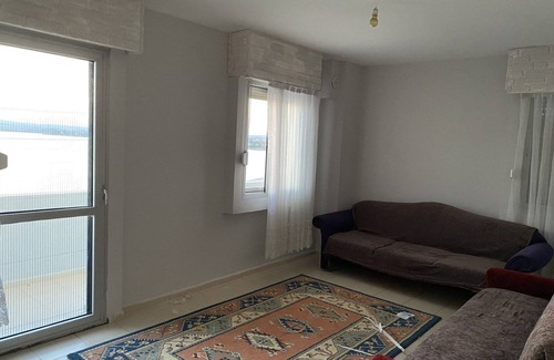 Seferihisar House | Oceanfront Sunset Duplex with Pool and Kitchen Amenities