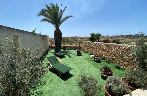 Gharb Villa | Experience Sunset Farmhouse: Pet-Friendly with Ocean Views