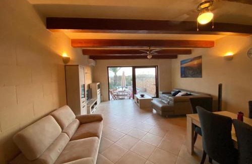 Gharb Villa | Experience Sunset Farmhouse: Pet-Friendly with Ocean Views