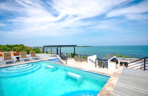 Placencia Apartment | Pet-Friendly Sunset Gecko Condos with Pool and Restaurant