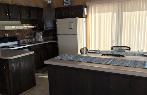 Town of Ledyard Cottage | Escape to Sunset Haven: Lakefront with Hot Tub & Waterslide