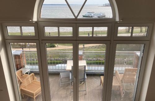 Alt Gaarz Apartment | Seaside Sunset Loft: Ocean View Maisonette with Balcony