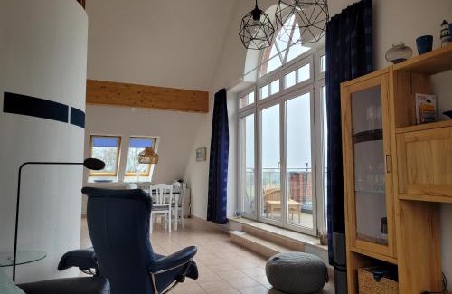 Alt Gaarz Apartment | Seaside Sunset Loft: Ocean View Maisonette with Balcony