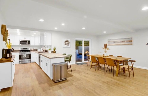 College East House | Discover Sunset Paradise: Heated Pool, Hot Tub & Ocean Views