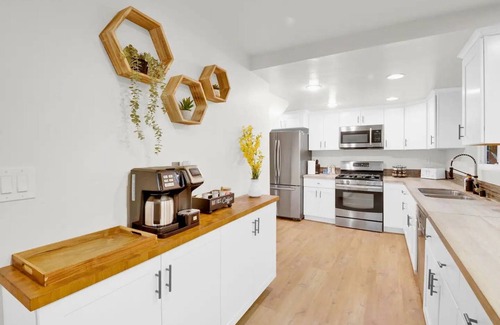College East House | Discover Sunset Paradise: Heated Pool, Hot Tub & Ocean Views
