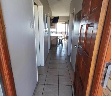 Jeffreys Bay Apartment | Oceanfront Sunset Sands: Family-Friendly Getaway Awaits