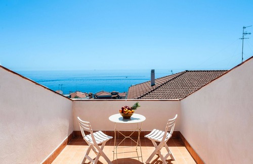 Aci Trezza Apartment | Inviting Sunset & Seaview Terrace with Family-Friendly Amenities
