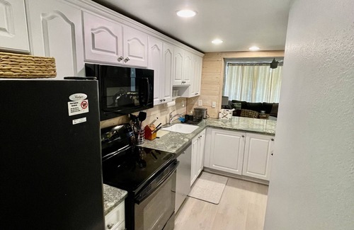 Key Largo Condo | Experience Sunset Serenity at Moon Bay: Waterfront Bliss