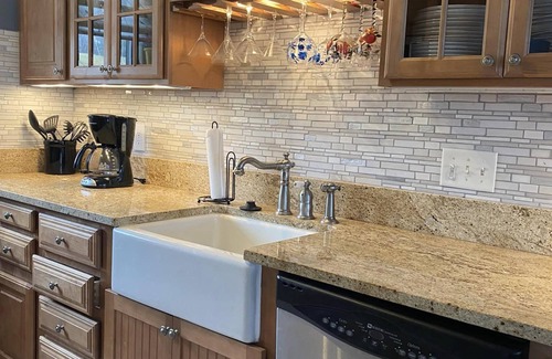 Dewittville Condo | Family-Friendly Sunset Shores Condo with Pool & Private Deck