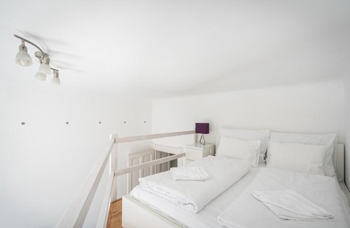 Kispest Apartment | Impressive Sunset Square Studio with Gallery & Family Amenities