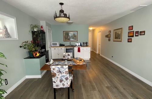 Cochrane Bed & Breakfast | Inviting Sunset Suite: Walkout, Breakfast & Dog-Friendly!