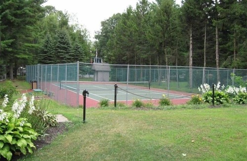 Pulaski House | Pet-Friendly Sunset Vacation Rentals with Lake Views