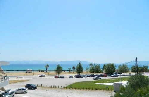 Paralia Ofryniou Apartment | Enjoy Sunset View: Oceanfront Bliss with Top Reviews