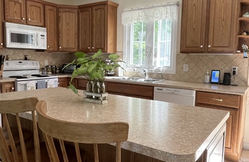 Sutton House | Prime Sunset View Lake Front Home with Oceanfront Access