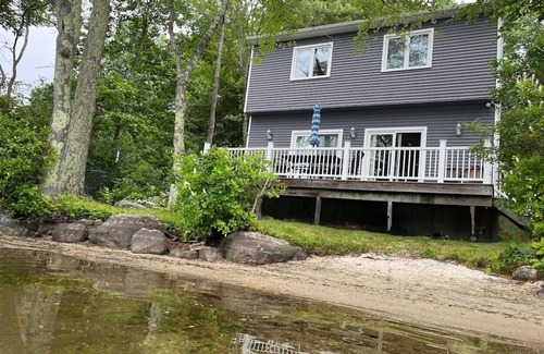 Sutton House | Prime Sunset View Lake Front Home with Oceanfront Access